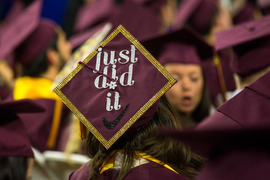 A graduation cap says, "Just did it"