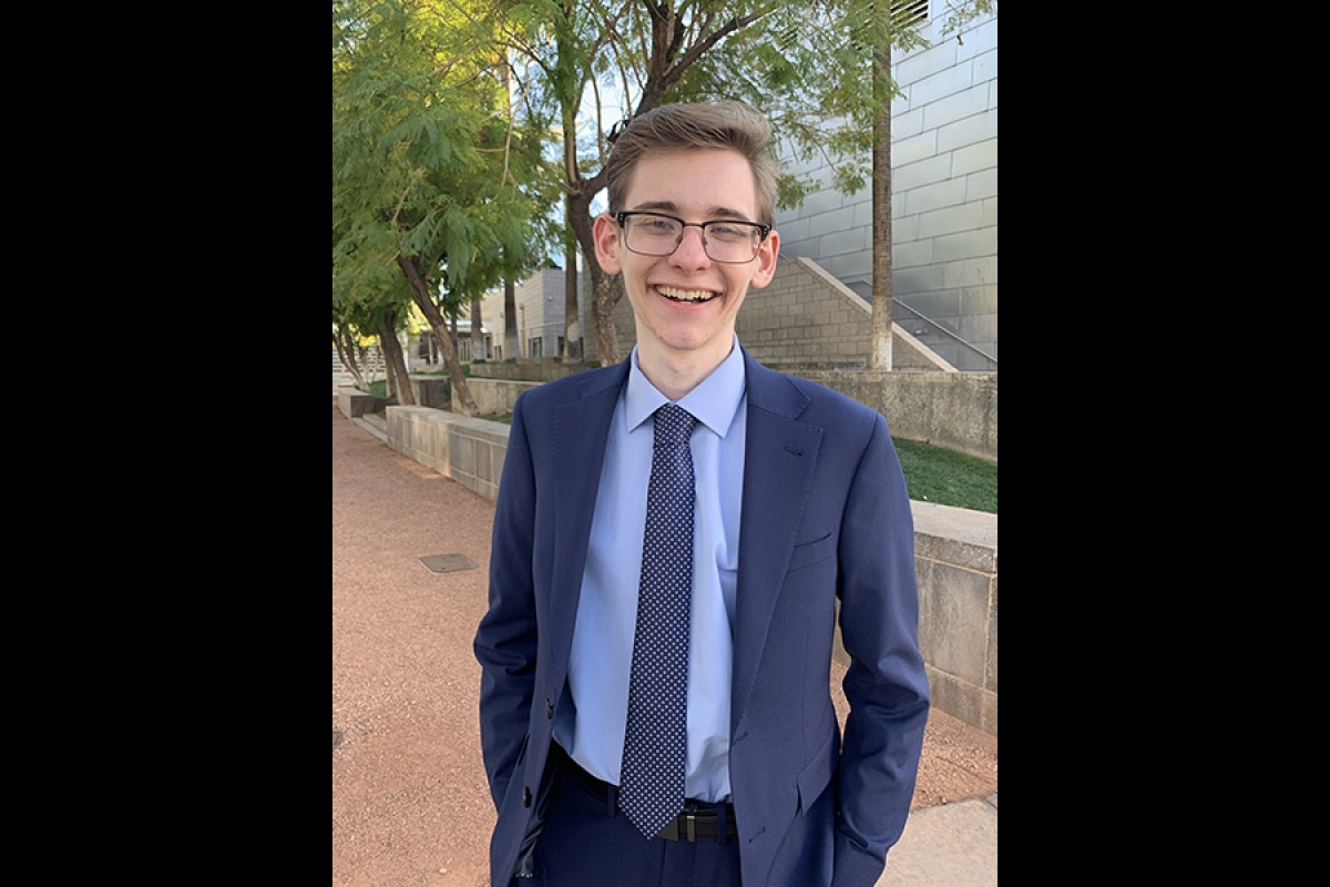 Rhodes Scholar Nathaniel Ross standing in front of ASU building