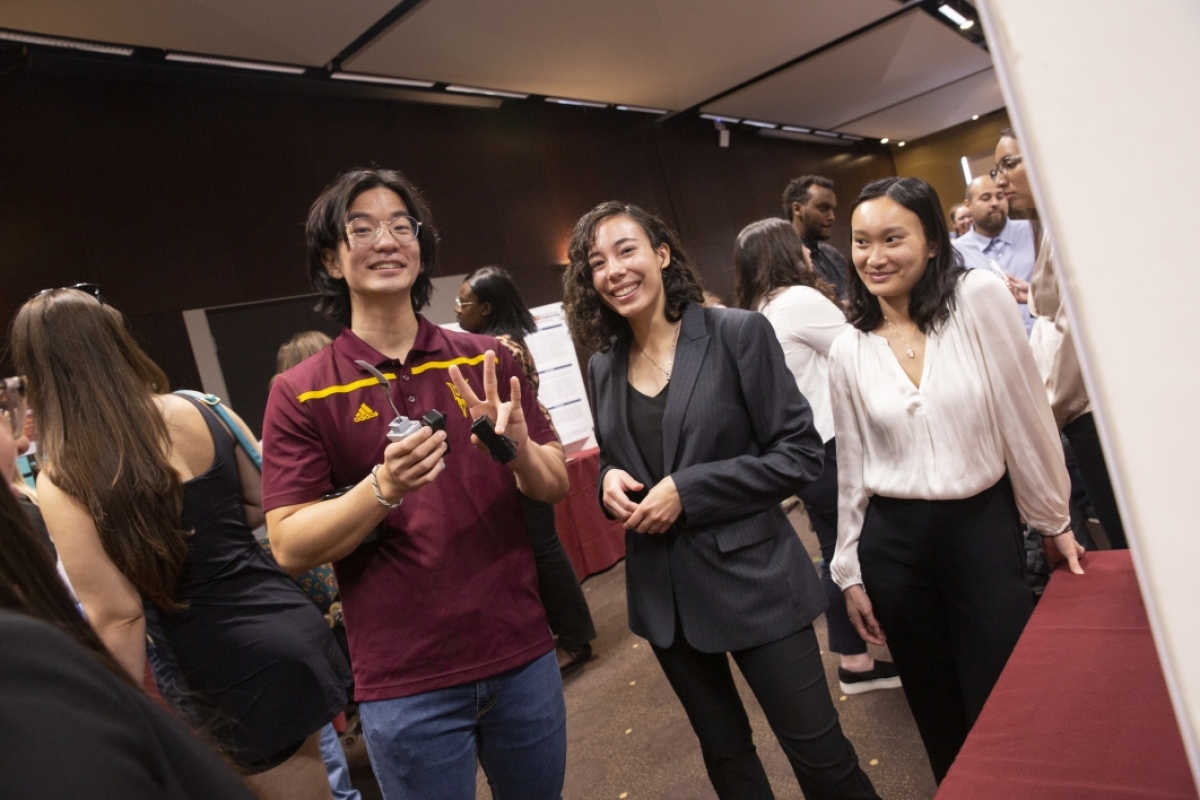 Students pose for the camera at the capstone showcasee