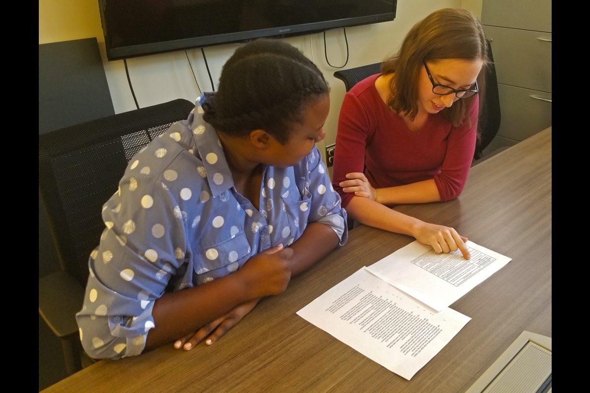 ASU student researchers Taija Hendrix and Emily Webb look at survey results