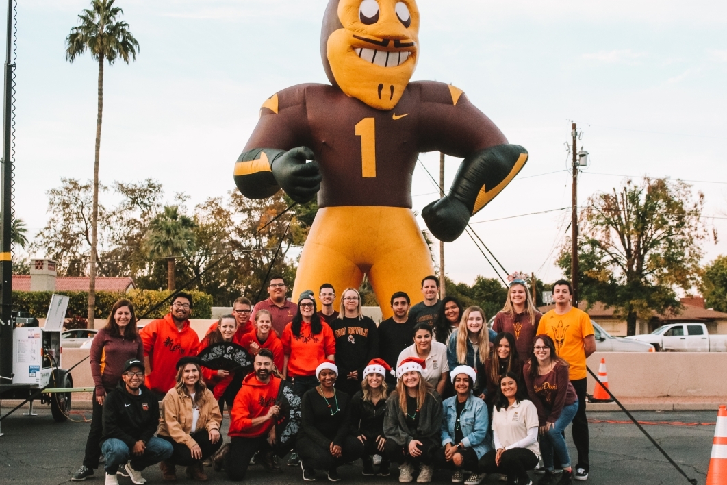 ASU class poses with giant inflatable Sparky