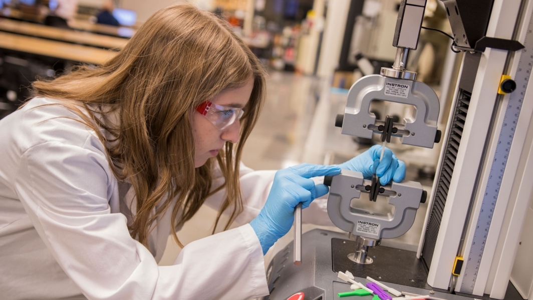 Grand Challenges Scholar Maeve Kennedy conducts chemical engineering and biomedical engineering research in the lab.