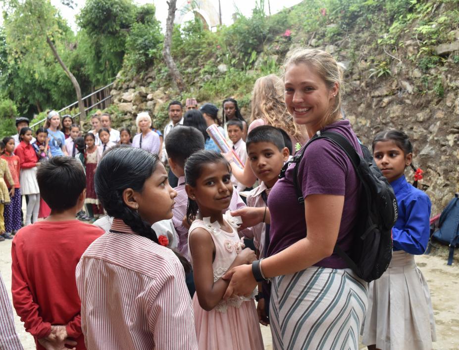 ASU student working with local school children in Nepal
