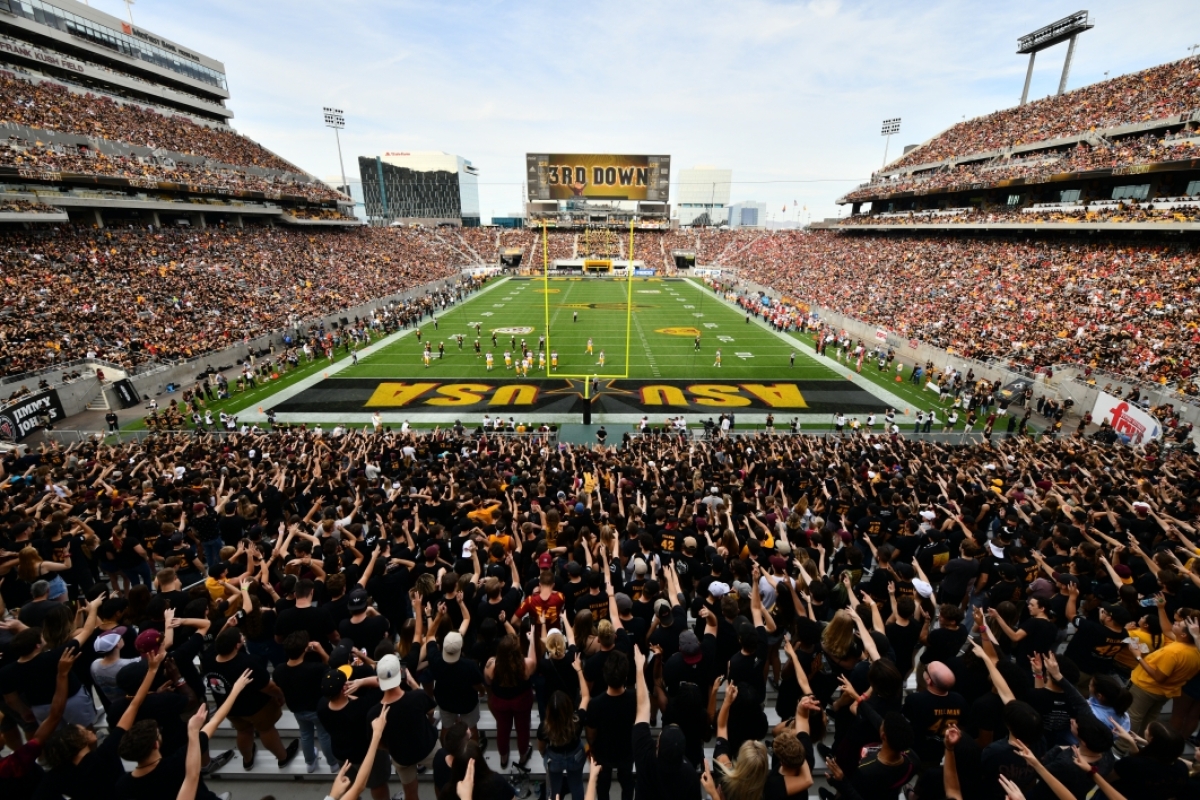 Fans cheering during game at ASU football stadium in 2019