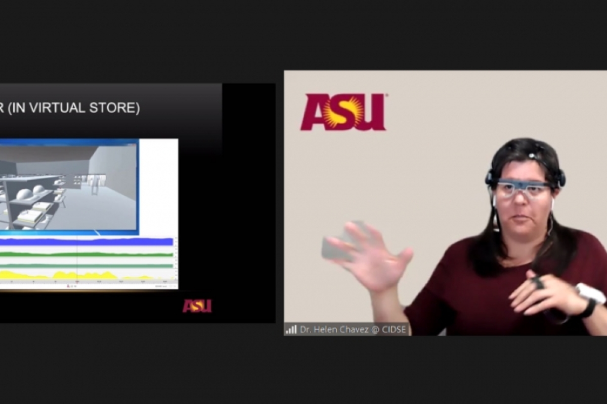 A Zoom screenshot of Lecturer Maria Elena Chavez-Echeagaray demonstrating a virtual reality store to teach SEE@ASU participants about user experience and computer science.