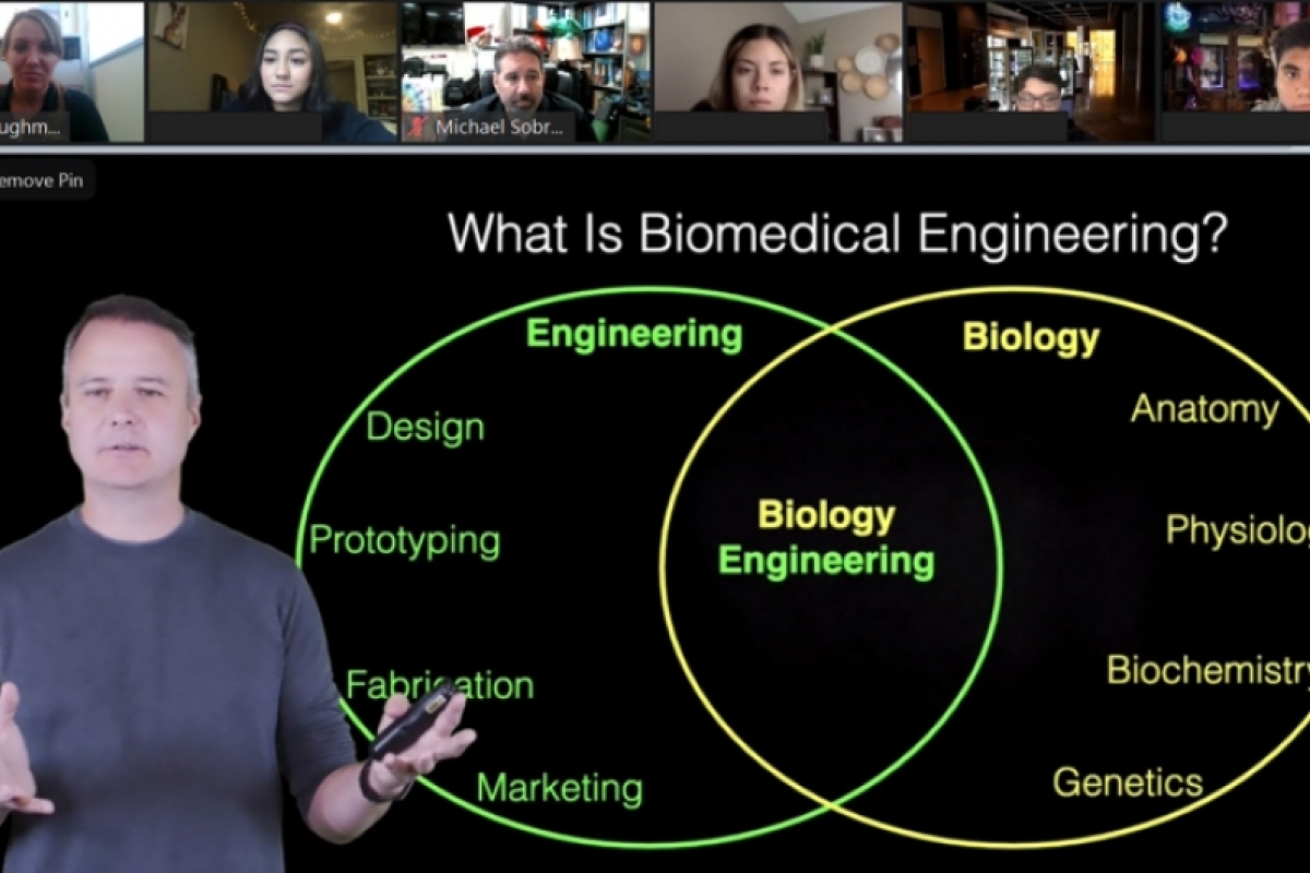A Zoom screenshot with Associate Professor Jeffrey Kleim and a Venn diagram of engineering and biology concepts that are used in biomedical engineering.