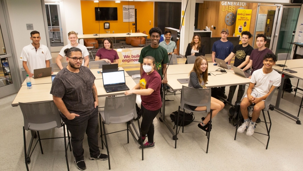 A group photo of members of the Solar Devils student organization in a classroom during spring 2022.