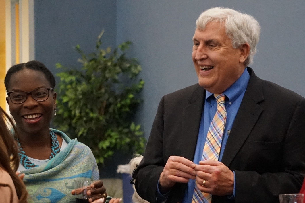 Richard Knopf and SCRD director Christine Buzinde stand next to one another smiling.