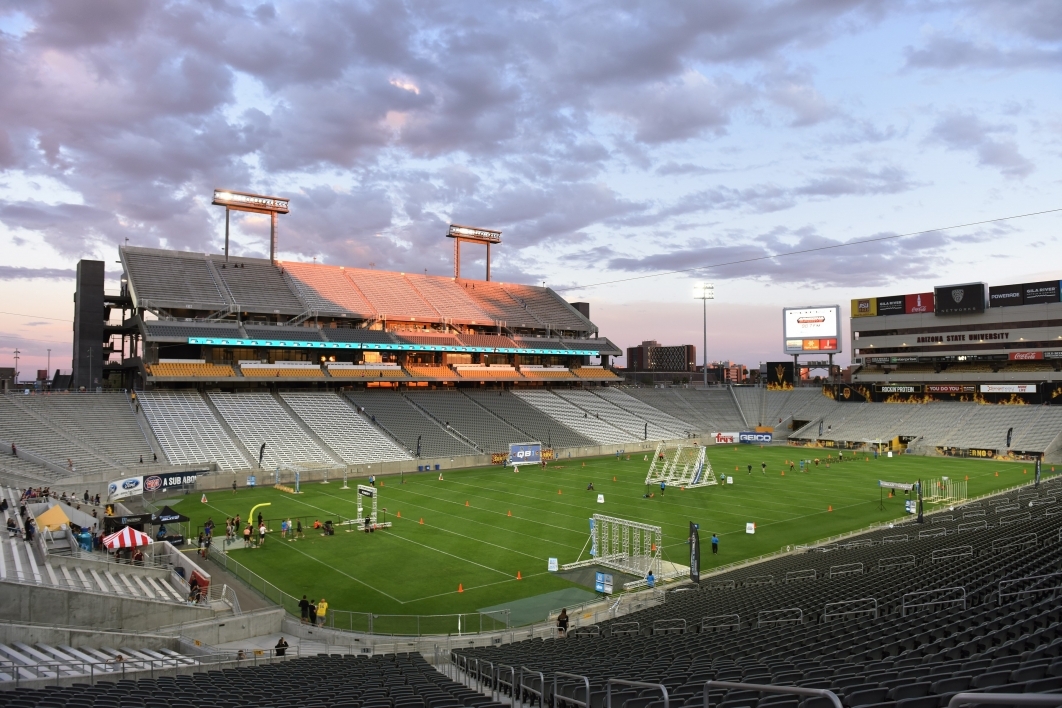 Wide shot of stadium field with obstacles