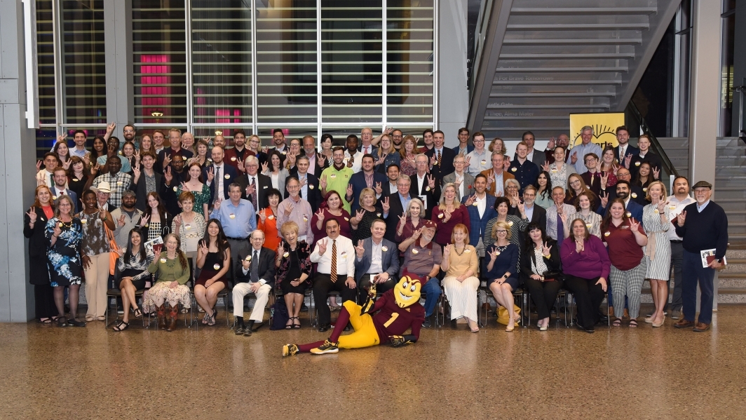Group photo of ASU alumni and former student government leaders with ASU mascot Sparky.