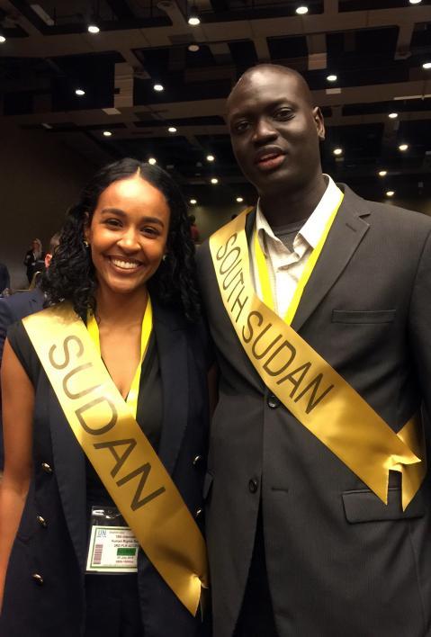 Lul stands side-by-side with the youth delegate for the Republic of Sudan