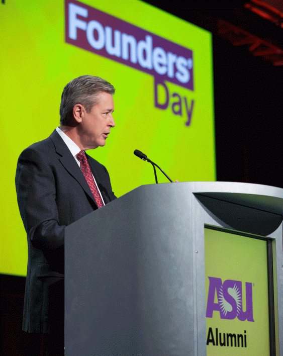 Ted Simons speaks at a lectern