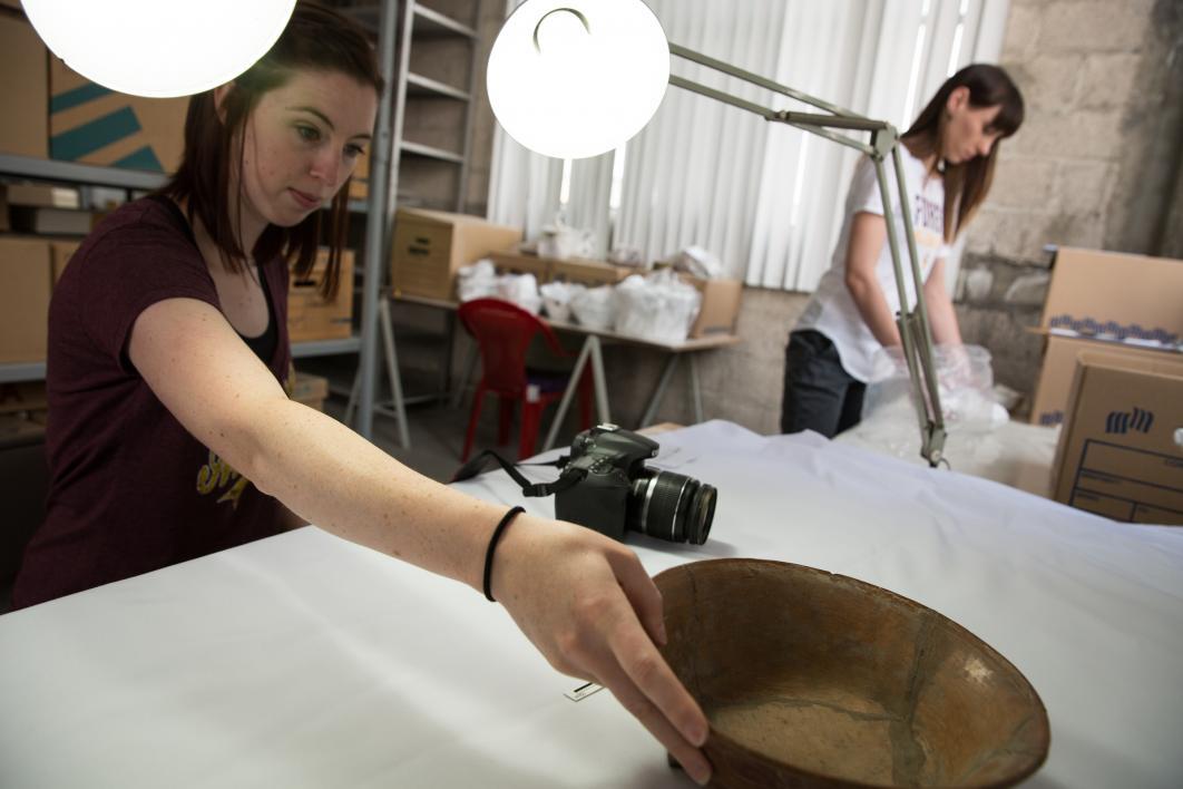 Two museum studies students organize the collection at the Teotihuacan Research Laboratory