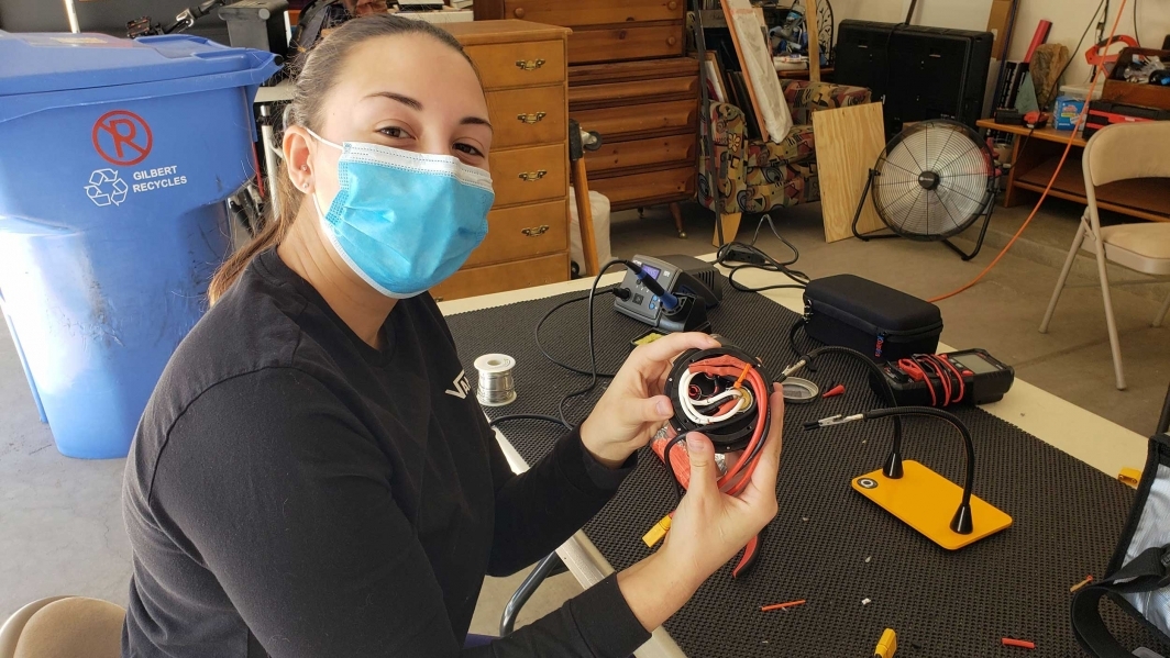 Laura Roty of the mechanical team assembling battery pod 2.