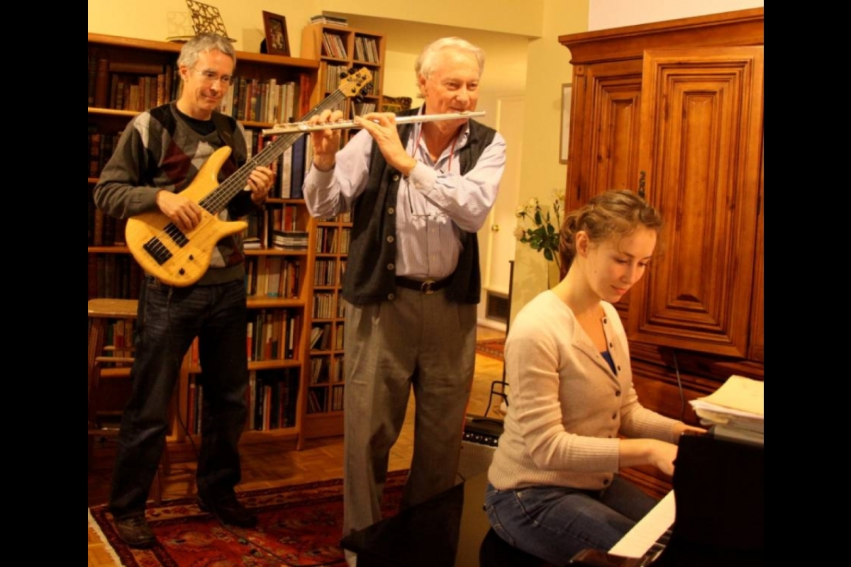 John Spence playing music with colleagues