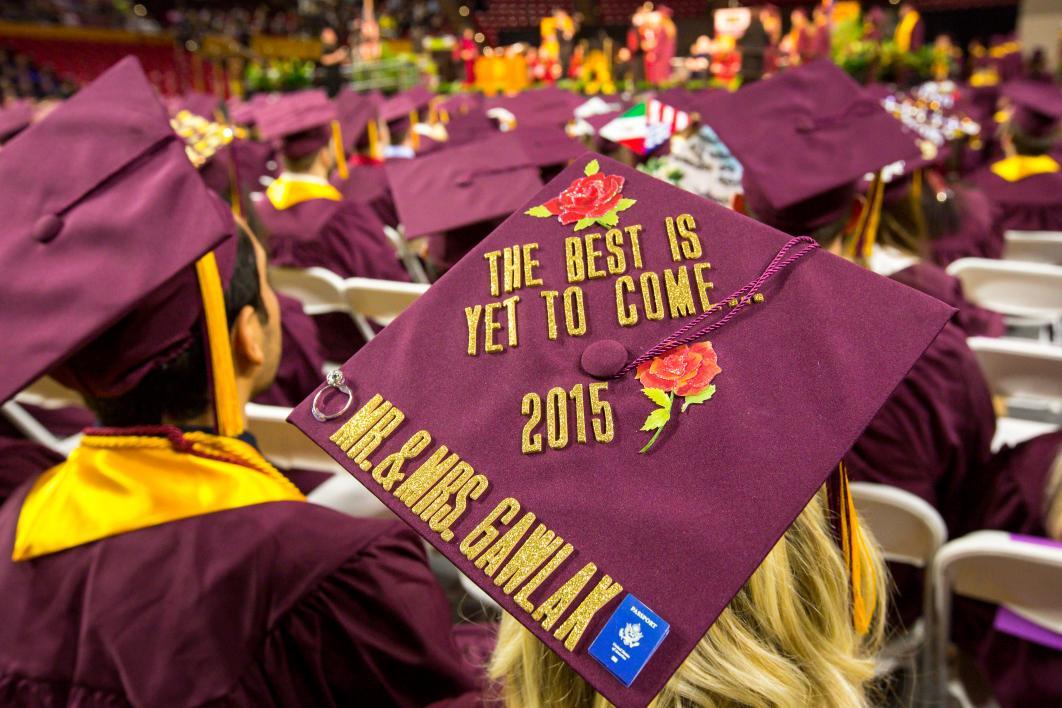 A graduation cap reads, 
