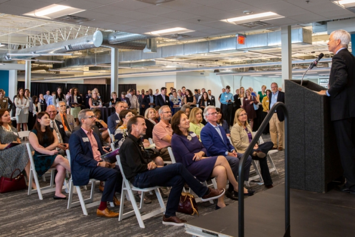 Gregory Raupp, research director of the WearTech Applied Research Center, addresses distinguished guests at the WearTech Applied Research Center grand opening on September 30
