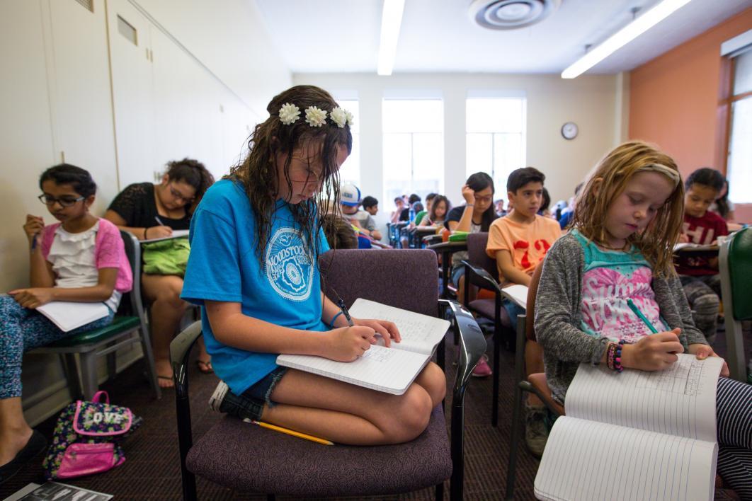 Young Adult Writing Program campers practice creative writing.