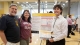 ASU biomedical engineering undergraduate student Maxwell Johnson poses with his parents and a research poster presenting his Fulton Undergraduate Research Initiative project findings.