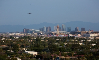 Skyline of the city of Phoenix, Arizona, with Phoenix Sky Harbor International Airport in the foreground.