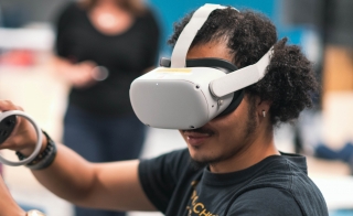 Person wearing a virtual headset.