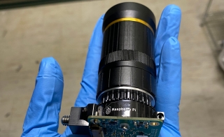A hand holds a polarimetric imaging camera
