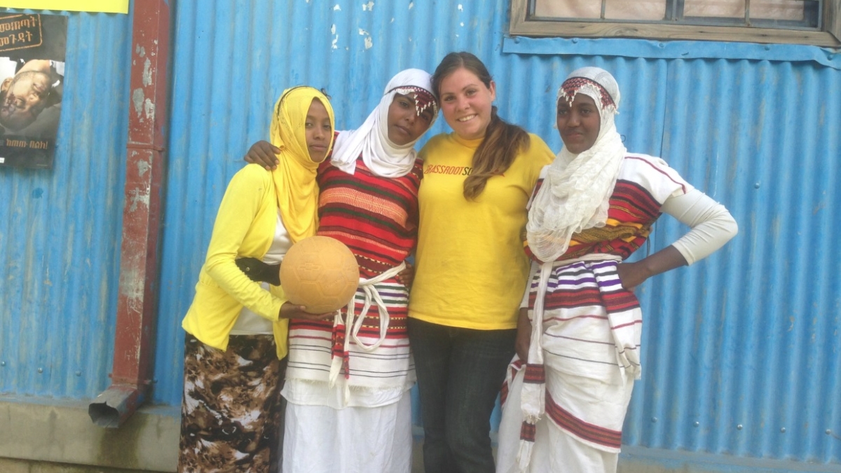 woman posing with women in Ethiopan dress