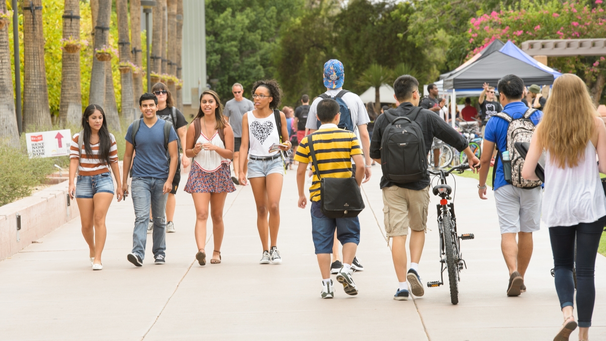 students walking on campus mall