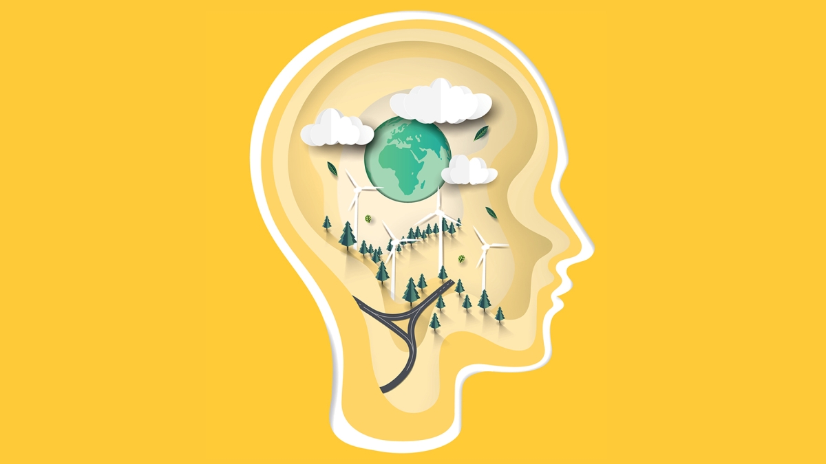 Illustration of a head with clouds and landscape inside it