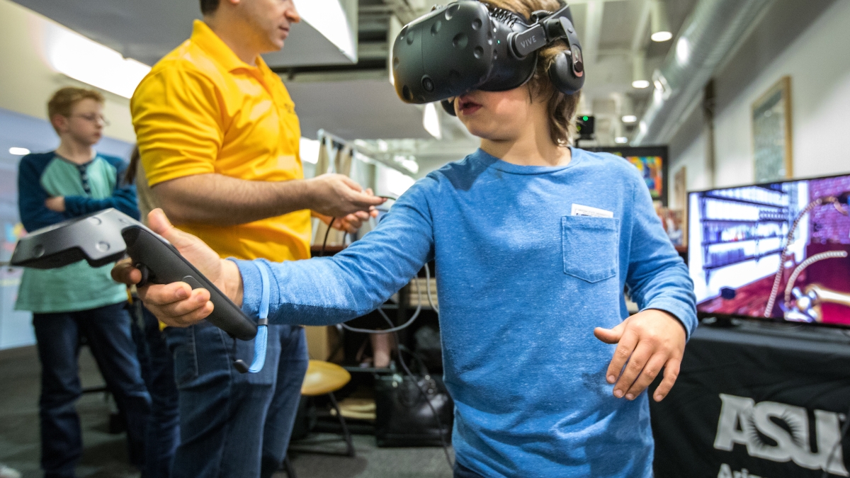 child using virtual reality set