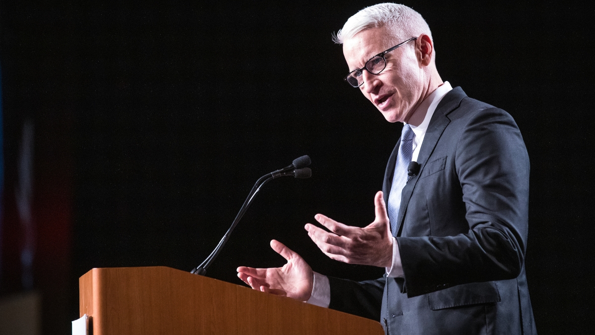 Anderson Cooper speaks at a lectern at an ASU Cronkite award luncheon