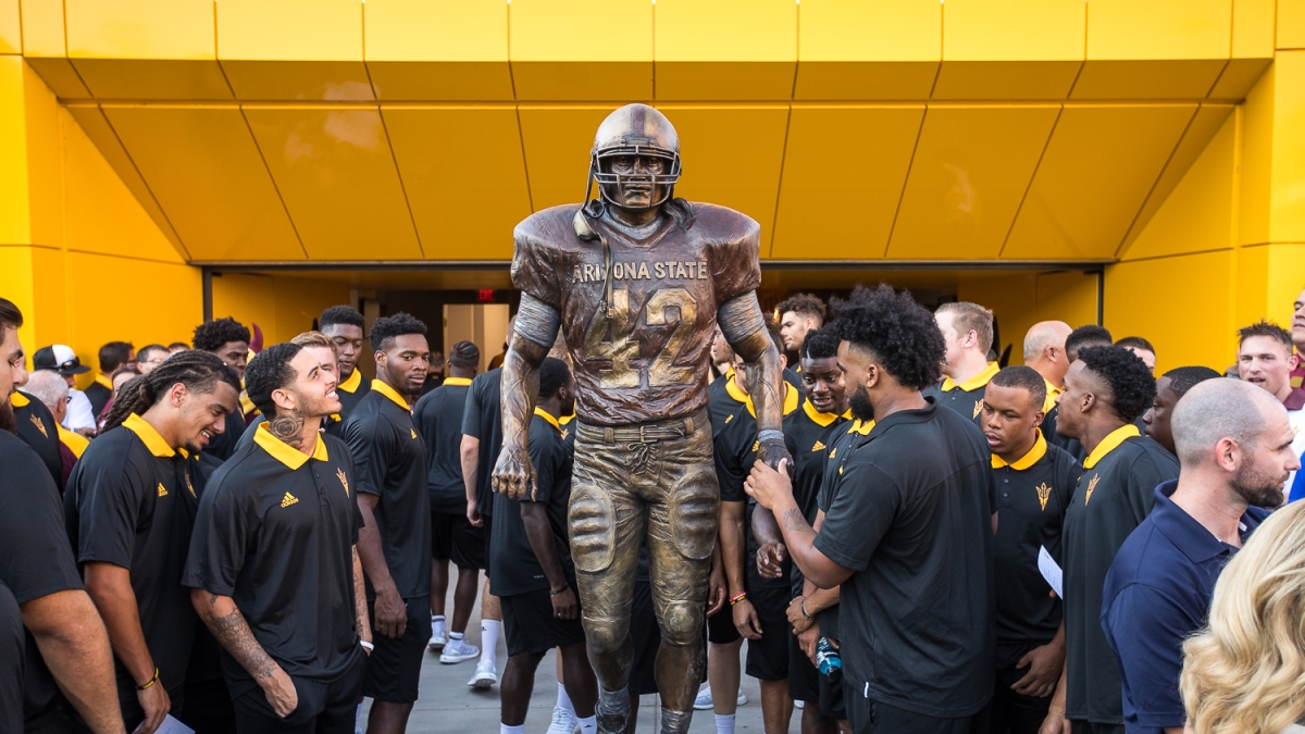 Players view Tillman Statue for first time