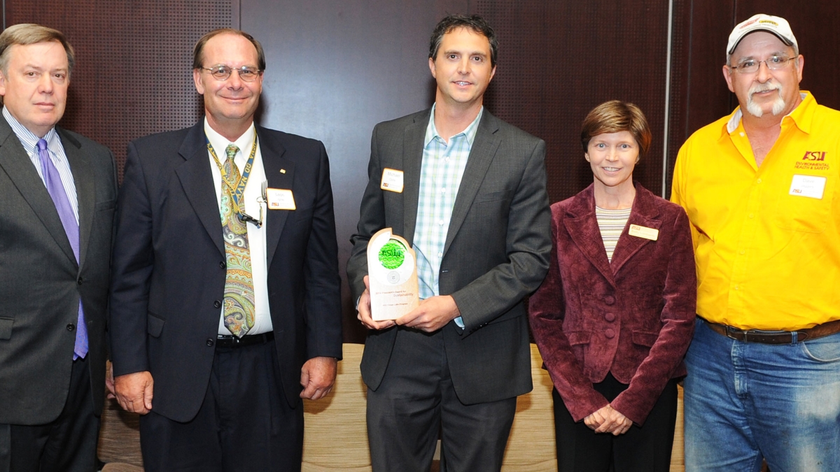 Green Labs team accepts their President's Award