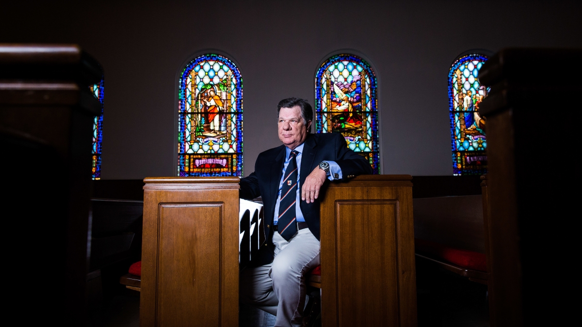 Instructor Charles Barfoot Sits in Church Pew