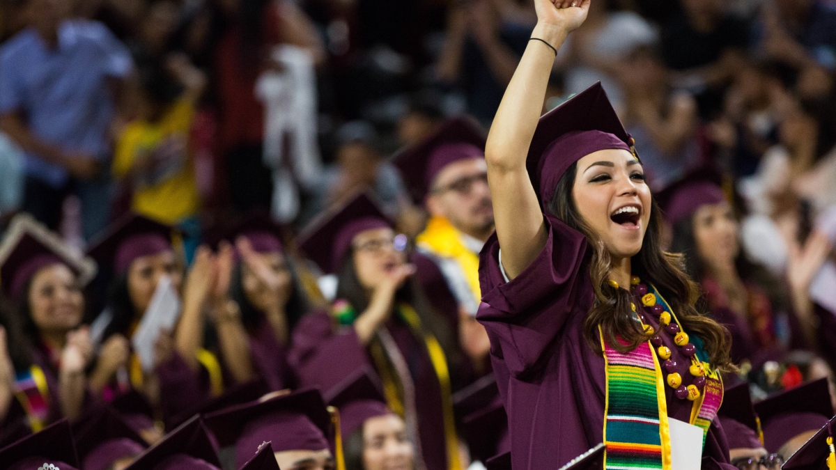 Student cheers during the Arizona State University Hispanic Convocation