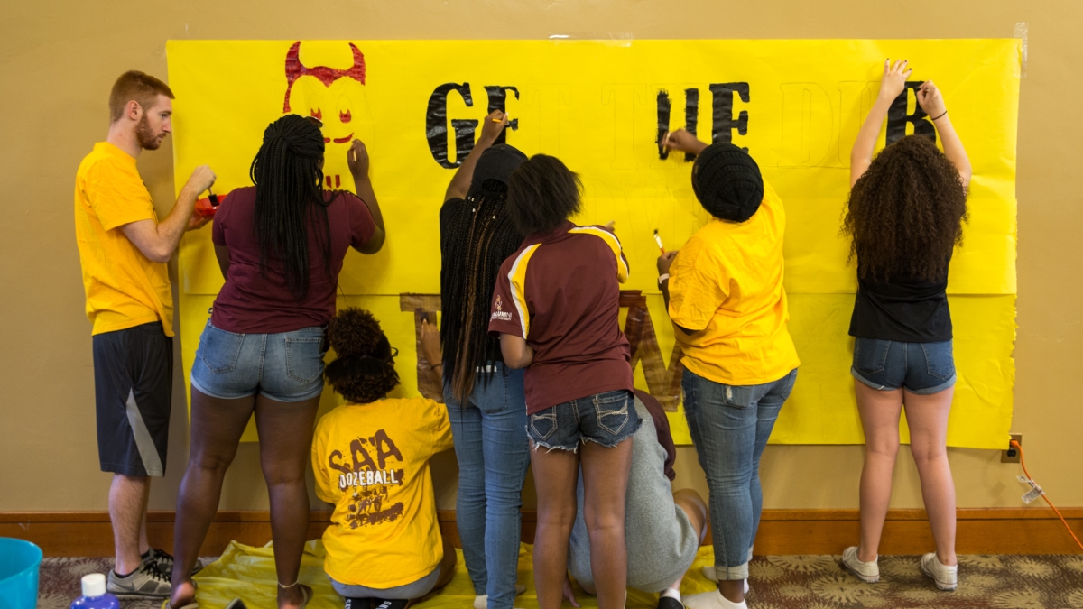 SAA game banner being painted