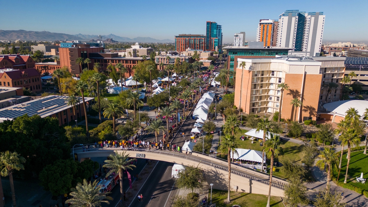 View of homecoming parade in downtown Tempe from a drone