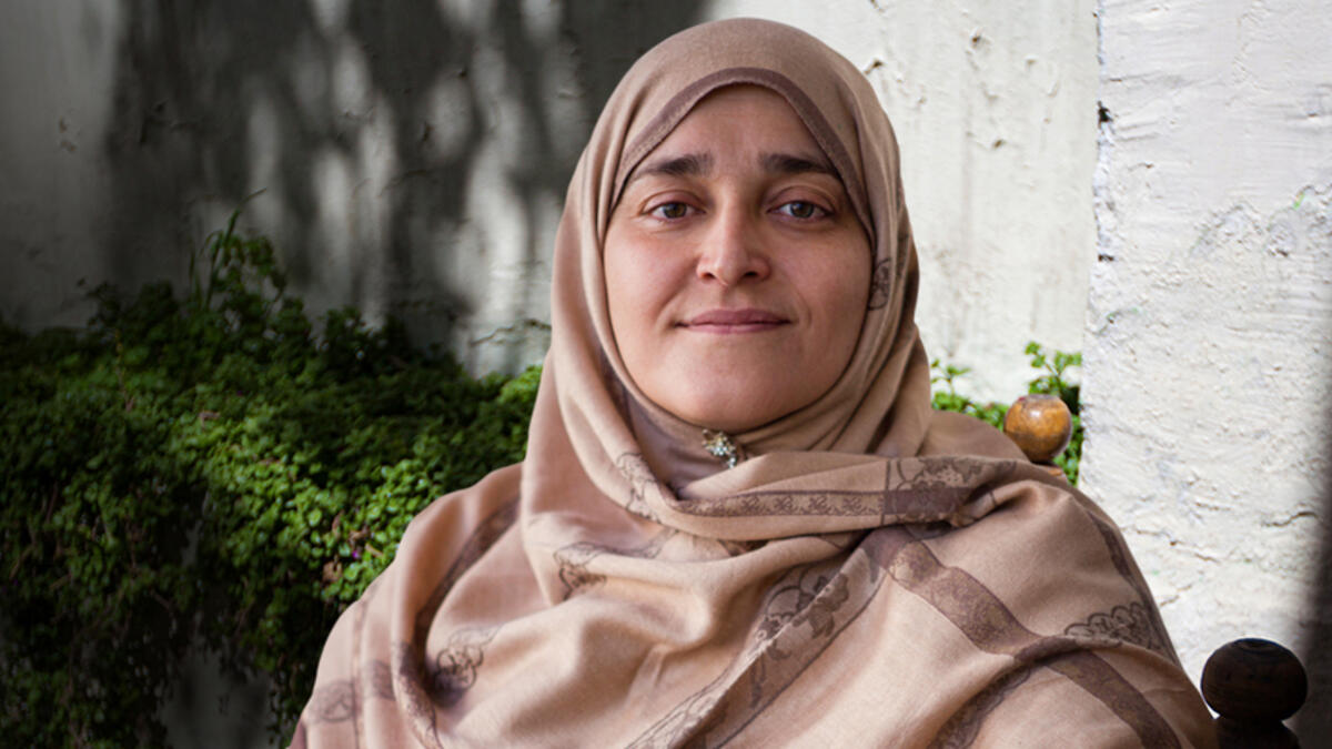 Headshot of Jamila Afghani.