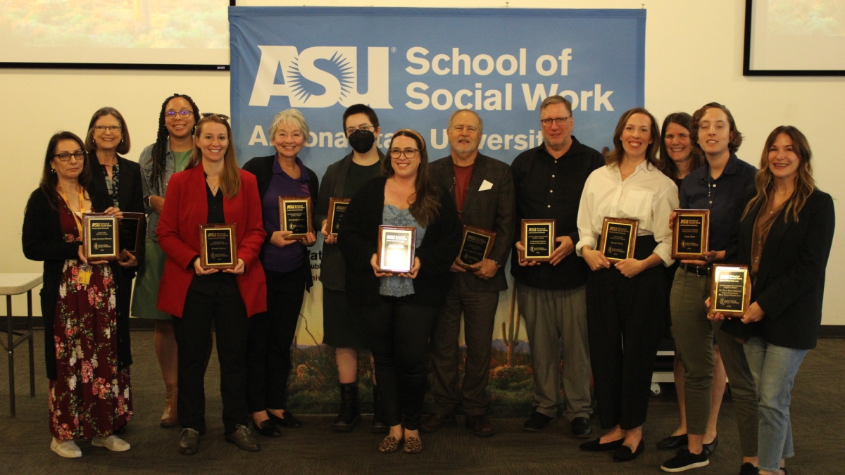Recipients of 2024 Social Work Month Awards pose for a group photo.
