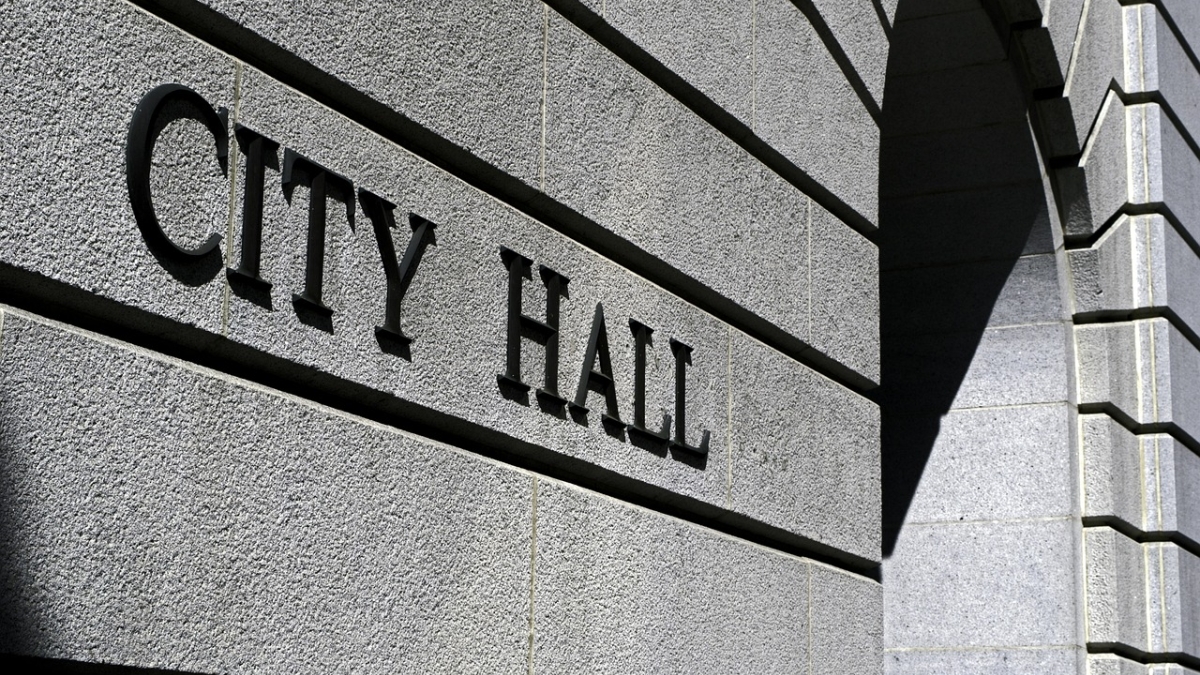 Black-and-white stock photo or city hall sign.