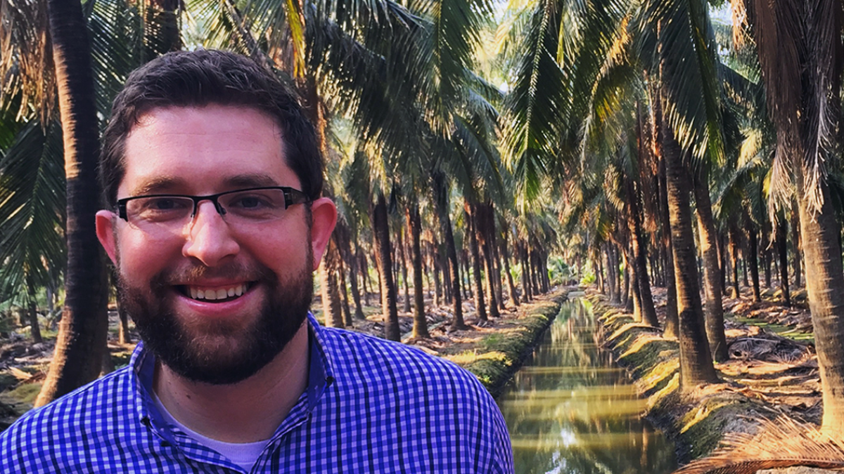 Image of Mike Nelson in a coconut farm.