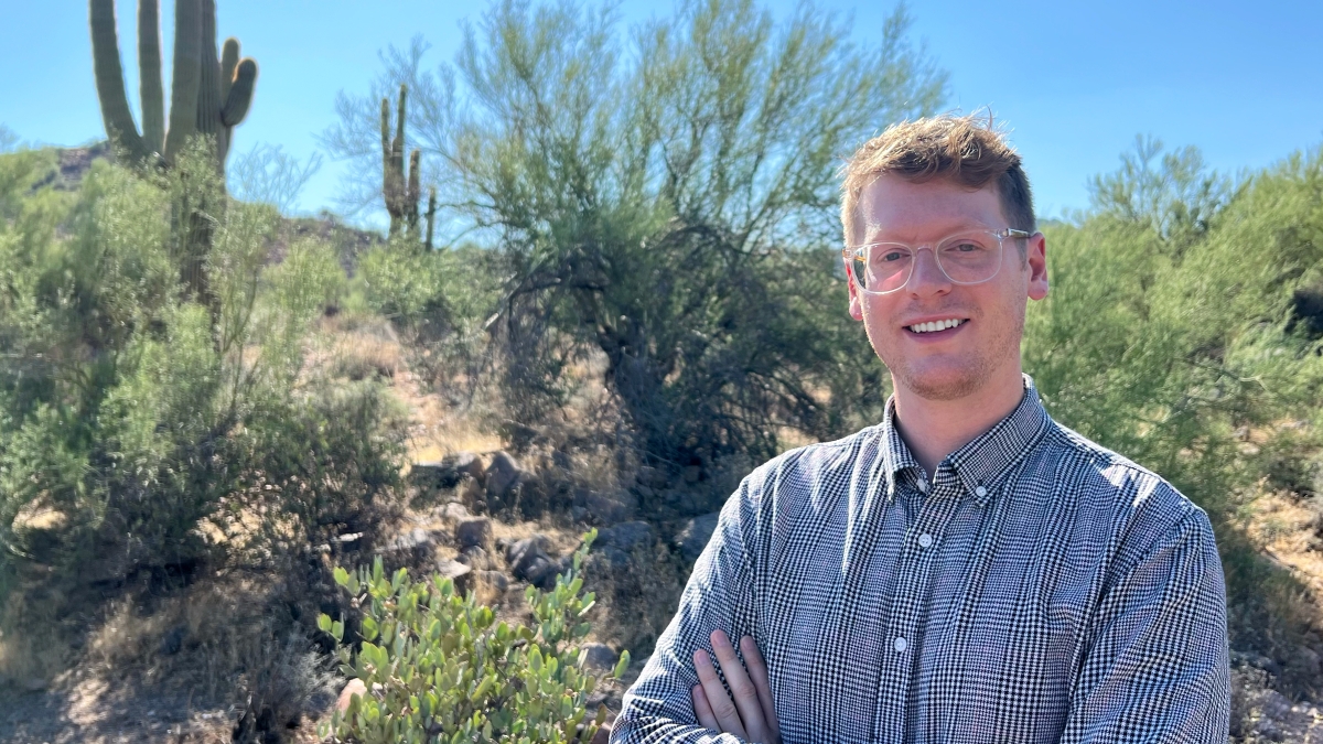 Portrait of Justin Earley in an outdoor desert setting.