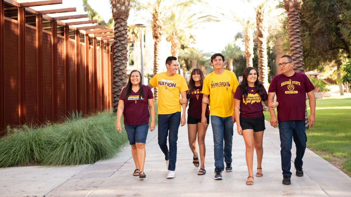 ASU family the Allison's walk down Palm Walk on the Tempe campus