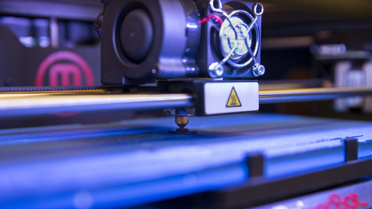 A 3D printer begins to print.