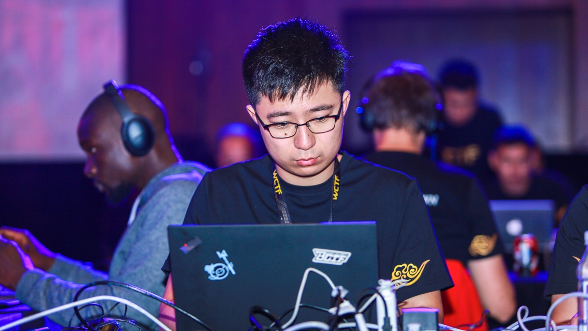 ASU student Kyle Zeng working on a laptop.