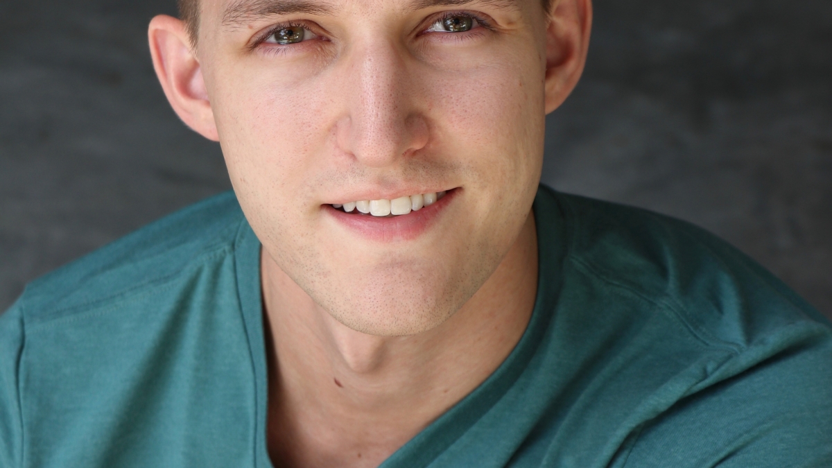 headshot of Arizona local and "Blue Man Group" performer Adam Zuick