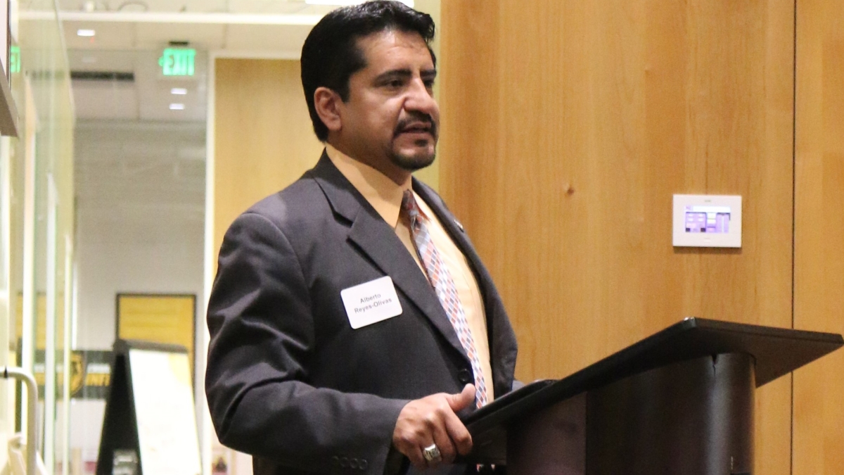 Executive Director of ASU's Pastor Center for Politics and Public Policy Alberto Olivas speaking at a lectern