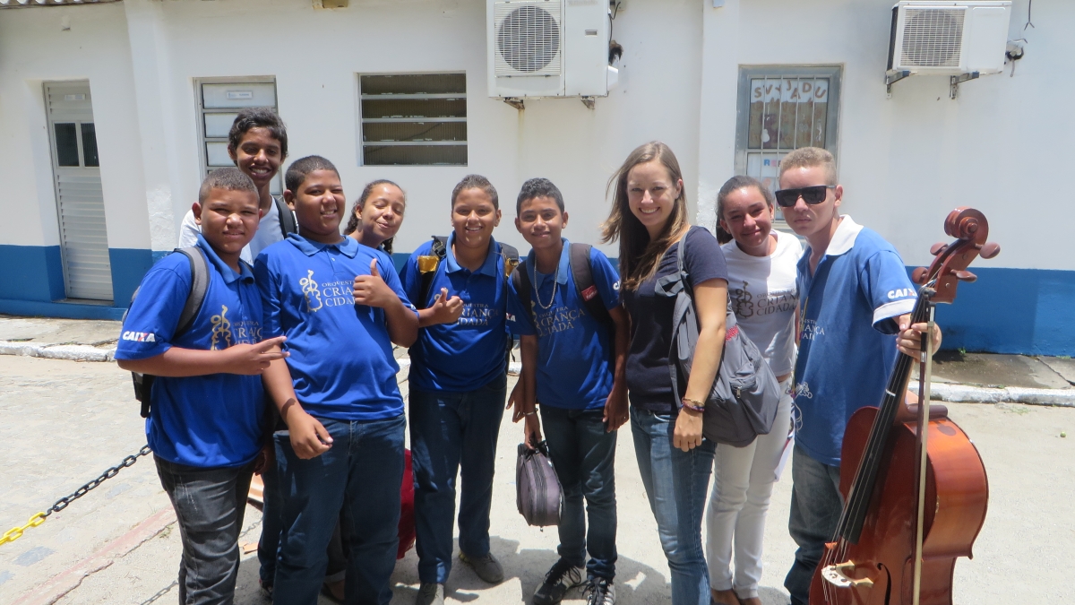 School of Music alum Amy Swietlik with a group of music students in Brazil