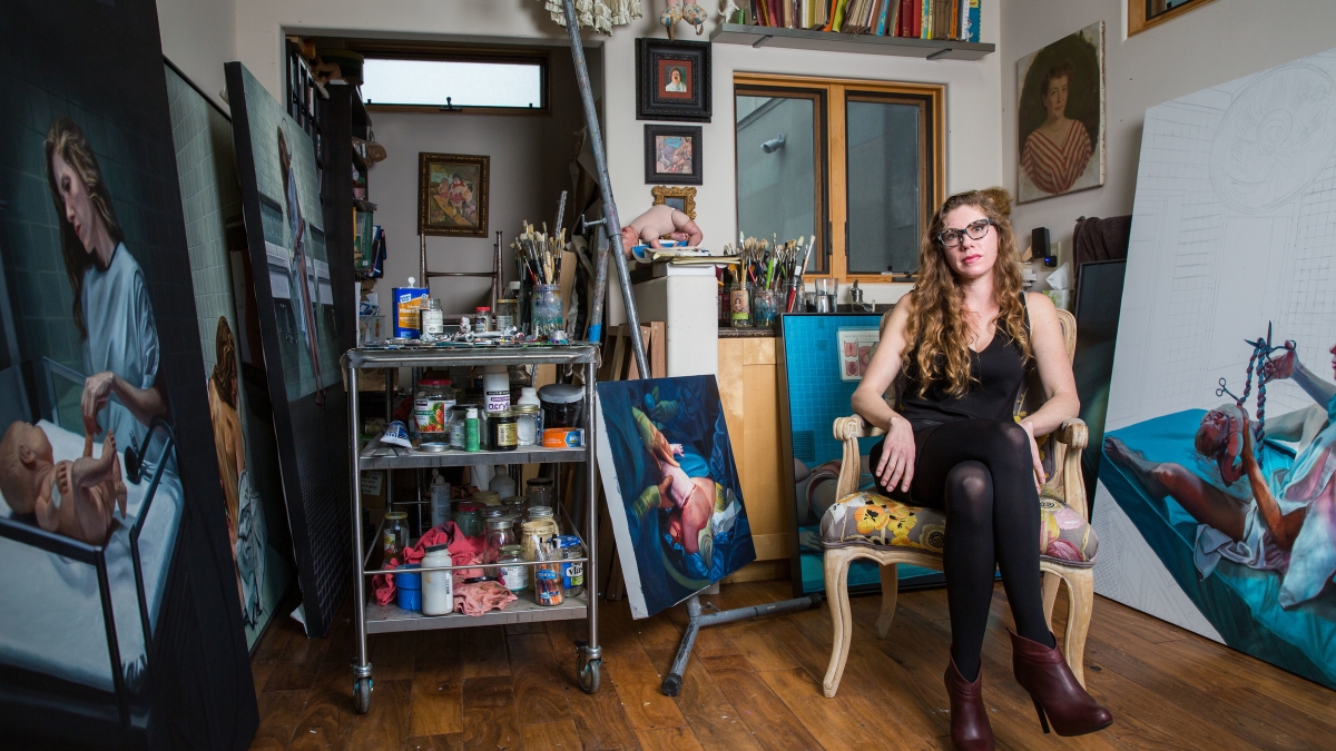 woman sitting in art studio