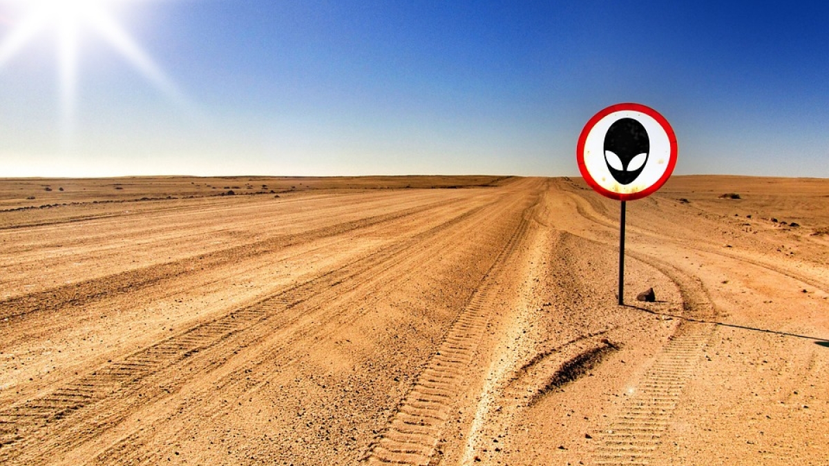 Desert road with sign